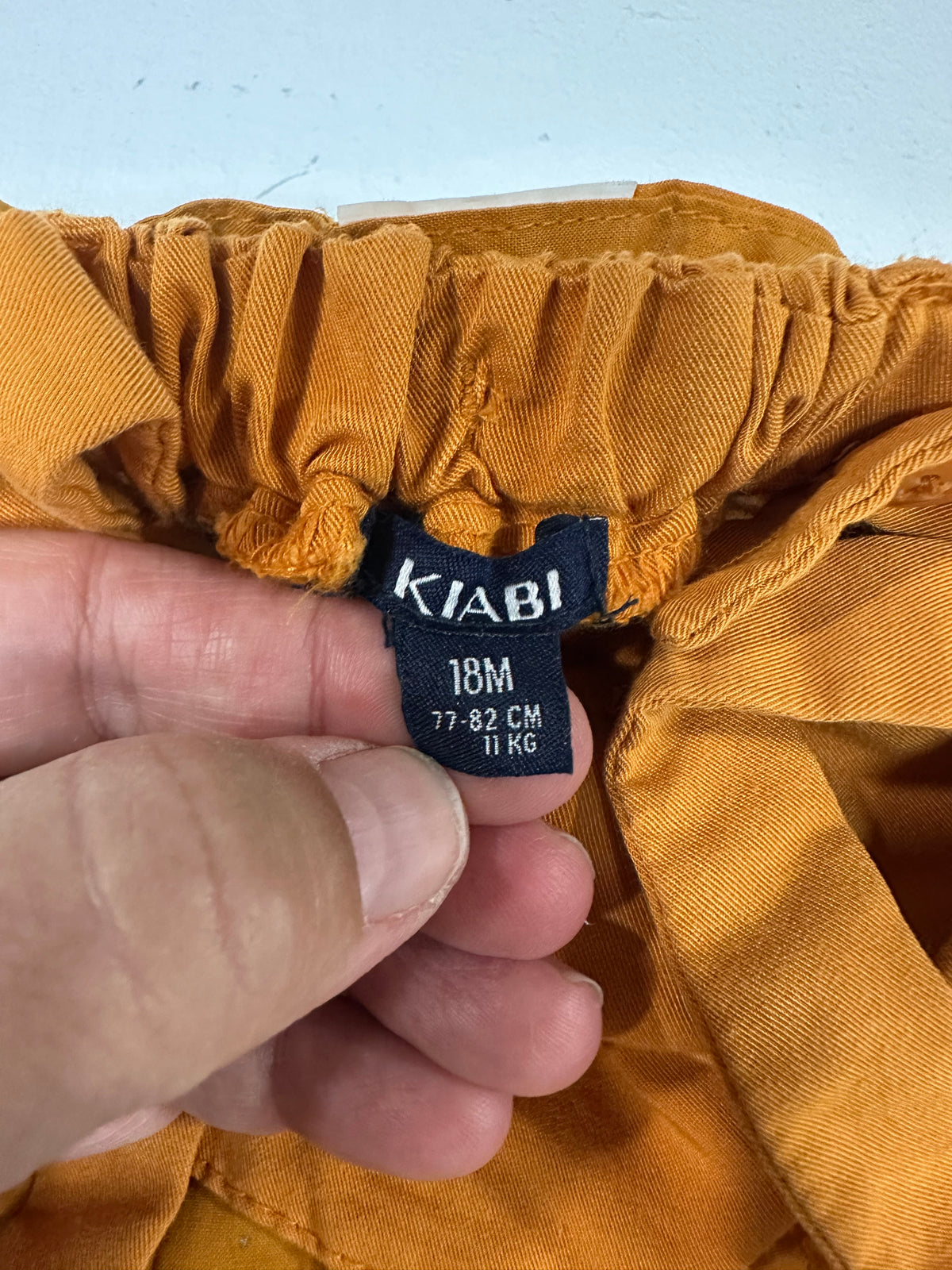 Vestido Pichi Bebé Niña Kiabi Talla 18 Meses (77-82 cm) - Color Mostaza / Teja con Cinturón