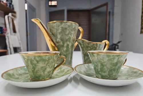 Antiguo juego de dos tazas de café.