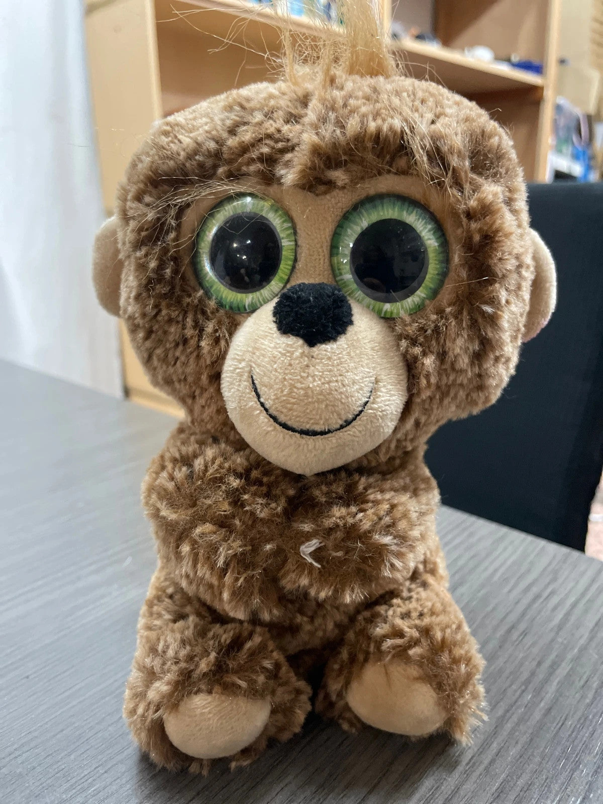 Mono de peluche marca Amén