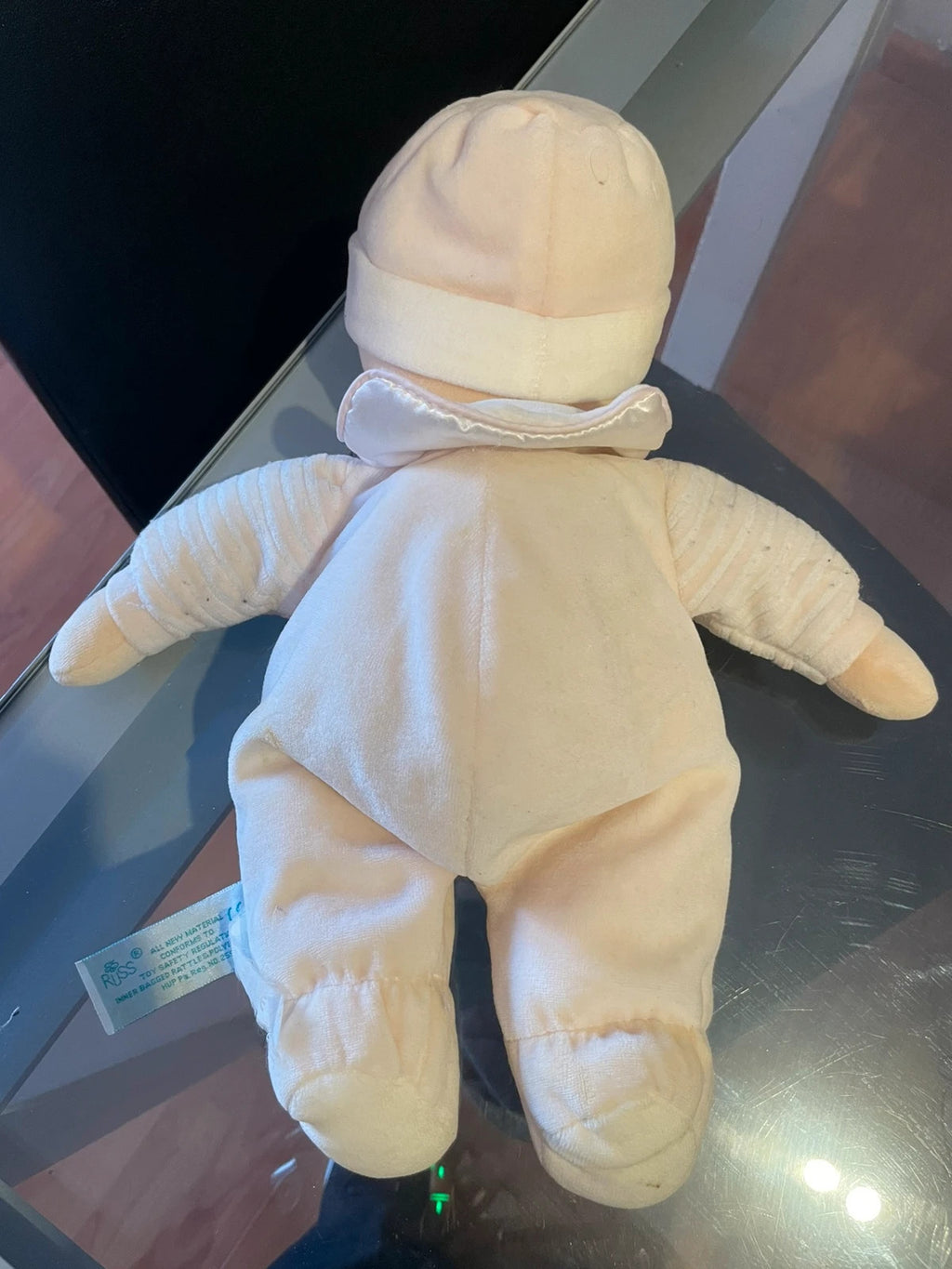 Muñeca de trapo con sonajero