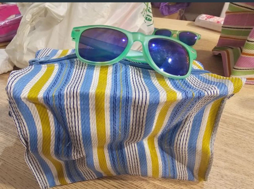 Conjunto de gafas, neceser para playa