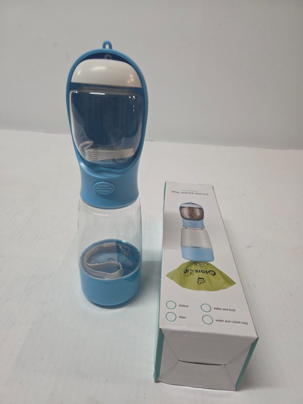Botella de Agua Portátil Multifunción para Perros 3 en 1 – Bebedero, Dispensador de Alimentos y Bolsas