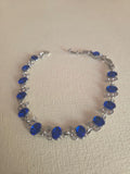 Pulsera Elegance de Cristales Ovalados en Azul Zafiro y Plateado