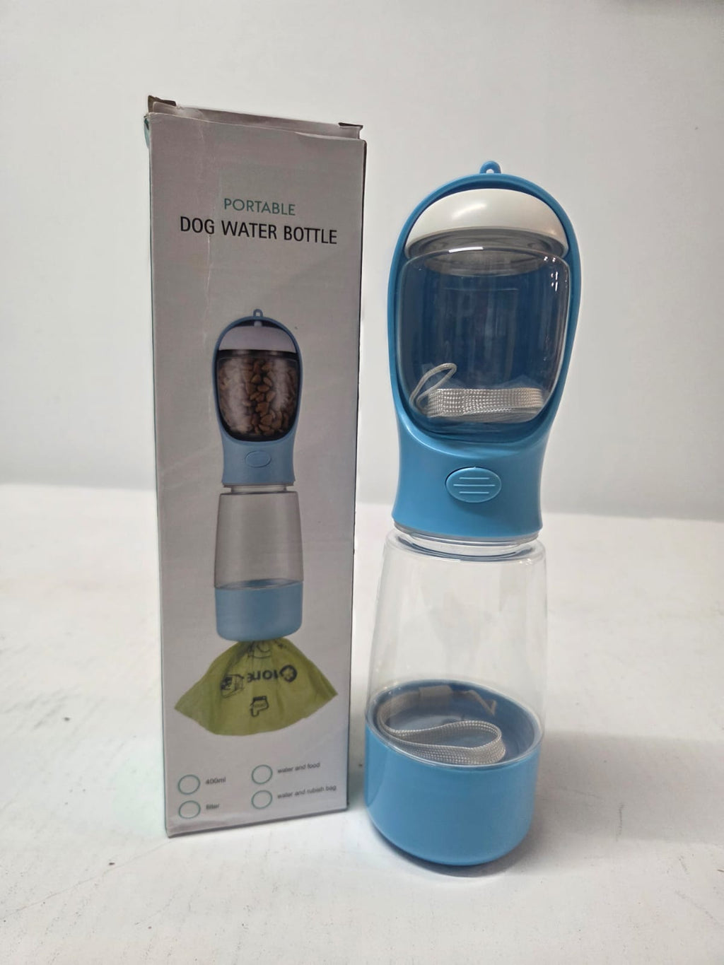 Botella de Agua Portátil Multifunción para Perros 3 en 1 – Bebedero, Dispensador de Alimentos y Bolsas