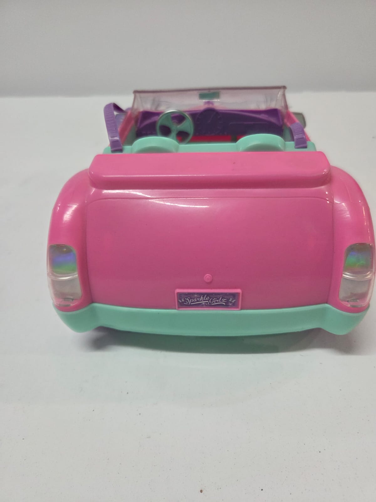 Auto Descapotable Rosa Sparkle Girlz para Muñecas (Con Detalle de Pestañas)