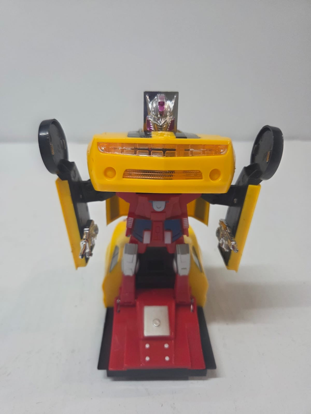 Auto Transformer Eléctrico con Luz LED y Sonido – Auto de Carreras Convertible en Robot