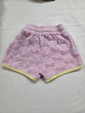 Shorts / Pantalón corto bebé niña Disney Baby rosa con lazos y detalles amarillos
